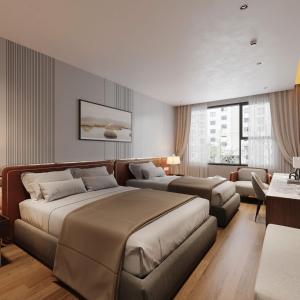 Postel nebo postele na pokoji v ubytování San Hanoi Hotel & Spa