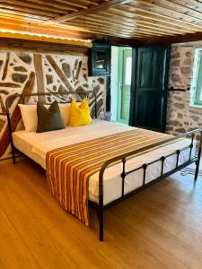 Katil atau katil-katil dalam bilik di Atelies View House