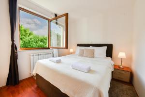Giường trong phòng chung tại Villa Čančar +105 ảnh