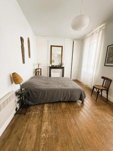 Ένα ή περισσότερα κρεβάτια σε δωμάτιο στο Villa La Belle époque +35 φωτογραφίες