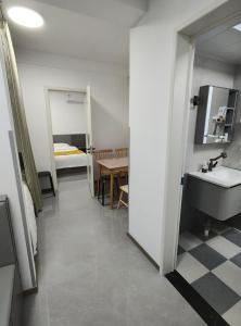 Kuchyň nebo kuchyňský kout v ubytování Little Mango Inn