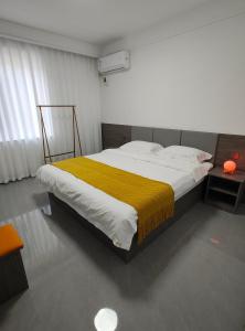 Postel nebo postele na pokoji v ubytování Little Mango Inn + 34 fotografií