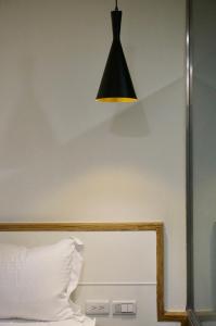 Ein Bett oder Betten in einem Zimmer der Unterkunft Shanmian Unmanned Hotel