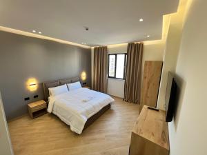 Postel nebo postele na pokoji v ubytování Hotel Tuyo