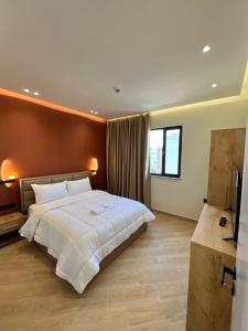 Postel nebo postele na pokoji v ubytování Hotel Tuyo