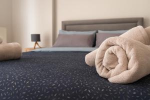 A bed or beds in a room at Guest-home 2