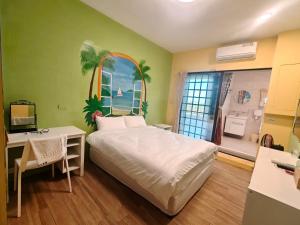 מיטה או מיטות בחדר ב-Xinyuanbao Shangshi Homestay