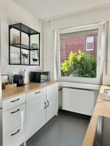 Η κουζίνα ή μικρή κουζίνα στο Stilvoll - Designwohnung nahe Westfield Centro