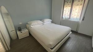 Posteľ alebo postele v izbe v ubytovaní Casa Carlotta Lake Como
