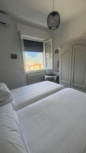 Posteľ alebo postele v izbe v ubytovaní Casa Carlotta Lake Como