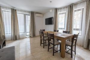 a dining room with a table and chairs at Sea Garden Marina 2 in Varna City