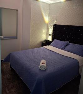 Giường trong phòng chung tại ZIG ZAG Hospedaje