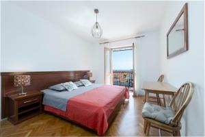 Postel nebo postele na pokoji v ubytování Guest House Međine