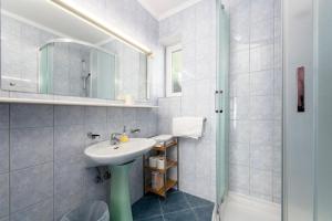 Koupelna v ubytování Guest House Međine