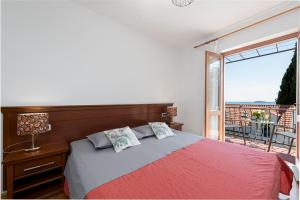 Postel nebo postele na pokoji v ubytování Guest House Međine