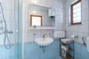 Koupelna v ubytování Guest House Međine + 37 fotografií