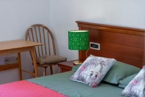 Postel nebo postele na pokoji v ubytování Guest House Međine