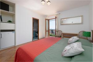 Postel nebo postele na pokoji v ubytování Guest House Međine