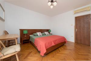 Postel nebo postele na pokoji v ubytování Guest House Međine