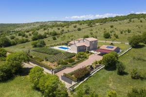 an aerial view of a house in a field at Heritage Villa Lilly in Krnica