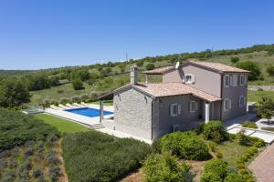 an aerial view of a villa with a swimming pool at Heritage Villa Lilly in Krnica +37 photos