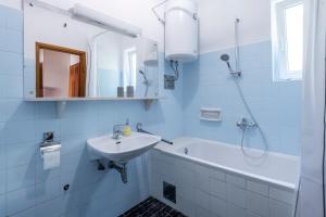 Koupelna v ubytování Guest House Međine
