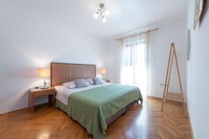 Postel nebo postele na pokoji v ubytování Guest House Međine
