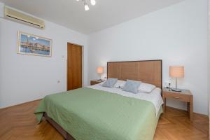 Postel nebo postele na pokoji v ubytování Guest House Međine