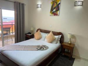 Postel nebo postele na pokoji v ubytování Hotel Barmoi