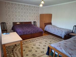 Postel nebo postele na pokoji v ubytování Center