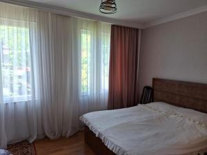 Postel nebo postele na pokoji v ubytování Center