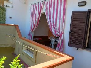Fotografie z fotogalerie ubytování Grazioso e confortevole attico, costa sud-ovest v destinaci Gonnesa