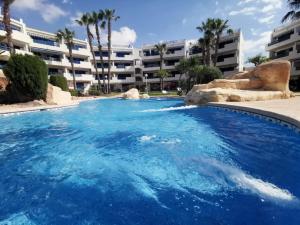 The swimming pool at or close to Otylia La Calma Sun Apartment With Sea View