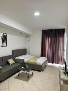 Postel nebo postele na pokoji v ubytování Apartament Niko shengjin