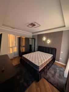 Ένα ή περισσότερα κρεβάτια σε δωμάτιο στο Luxury Hideaway, Parking & Self Check-In in Pipera - North Bucharest +36 φωτογραφίες