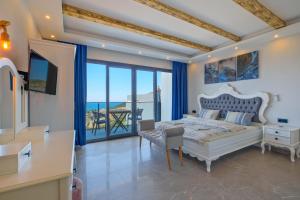 Postel nebo postele na pokoji v ubytování Villa Sea Renity + 37 fotografií