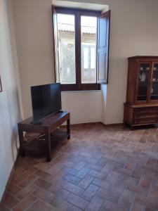 Televisor o centre d'entreteniment de Casa Vacanze "Il Mirto"