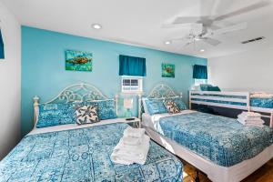 Postel nebo postele na pokoji v ubytování A Texas Star Beachfront 3BR