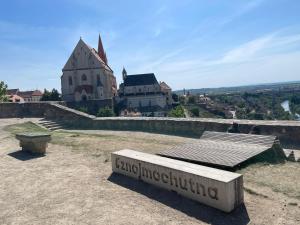 a building with a sign in front of it at ZnojmoApartment in Znojmo +3 photos