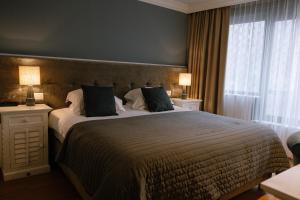 Postel nebo postele na pokoji v ubytování Hotel Cocoon