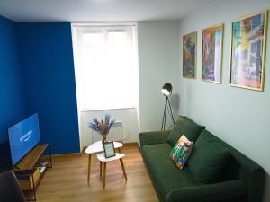 Posezení v ubytování L'Échappée douce, central et lumineux + 24 fotografií