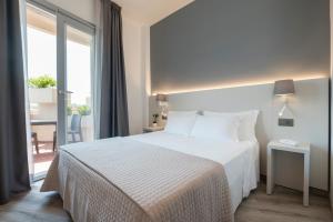 Кровать или кровати в номере Hotel Palace