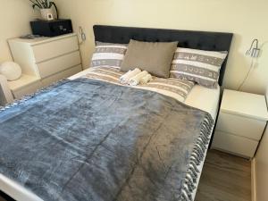 Postel nebo postele na pokoji v ubytování Just Like Home Bed & Spa Porsgrunn
