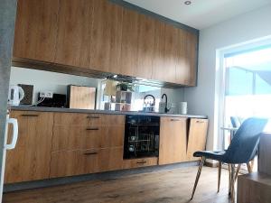 Køkken eller tekøkken på Magical Mirror Apartment