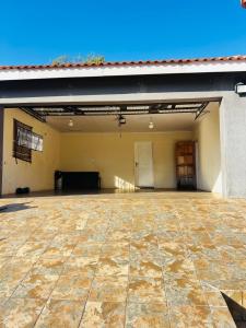 a large empty garage with a large stone floor at The Barberton Nest in Barberton