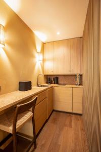 Η κουζίνα ή μικρή κουζίνα στο Charming Studio with A-C - 2P - Center St Tropez