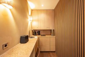 Η κουζίνα ή μικρή κουζίνα στο Charming Studio with A-C - 2P - Center St Tropez