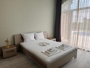 Ένα ή περισσότερα κρεβάτια σε δωμάτιο στο ATEA complex with pool next to the beach +32 φωτογραφίες