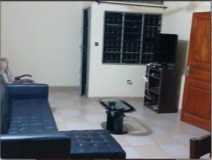 Χώρος καθιστικού στο Maison spacieuse à Porto-Novo