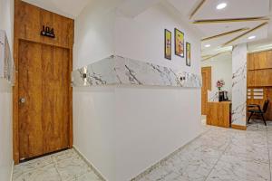 Kuchyň nebo kuchyňský kout v ubytování Hotel O Reet Villa